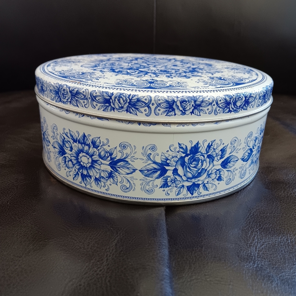 Vintage tin with sewing notions